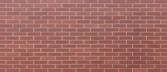 Wall from new wonderful red bricks. Panorama texture