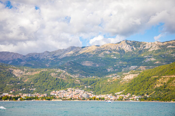 Fototapeta na wymiar View from water of the Budva city in Montenegro, view from island of St. Nicholas