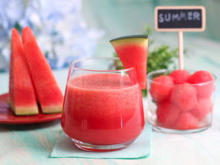 A glass of fresh watermelon with sliced of its pieces. It contains a lot of health benefits and a healthy fruit for diet people 