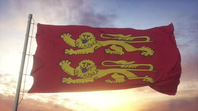 Normandy flag, France, waving in the wind, sky and sun background
