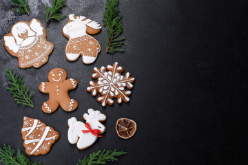 Christmas festive gingerbread made at home on a dark table