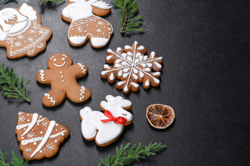 Christmas festive gingerbread made at home on a dark table