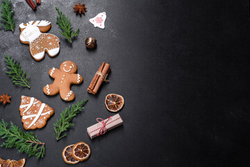 Christmas festive gingerbread made at home on a dark table