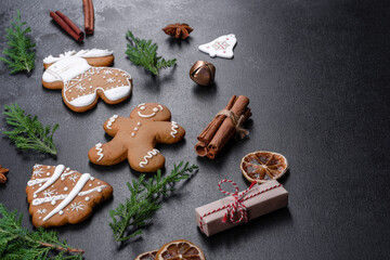 Christmas festive gingerbread made at home on a dark table