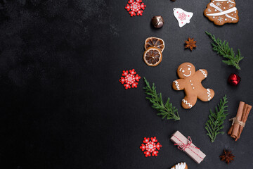 Christmas festive gingerbread made at home on a dark table