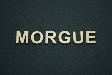 Obraz premium text on word morgue from gray wooden letters on a black backgroun