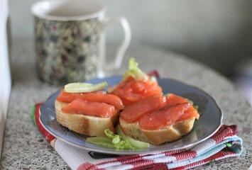 Closeup sandwich with salmon appetizer sea food delicious hand food eat breakfast dinner lunch nobody kitchen cooking cafe bread fresh healthy tasty