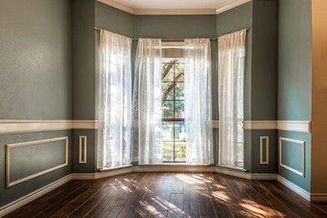 Empty living room with hardwood floors