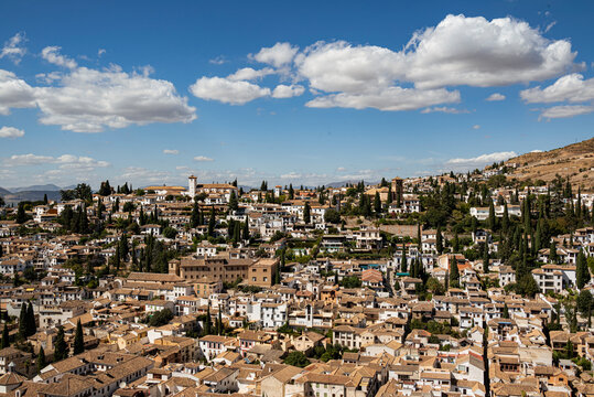 Beautiful Panorama Of The Albaicín, The Historic City Center Of Granada With Its Characteristic White House Under A Picturesque  Sky, Seen From The Alhambra Palace, Andalusia, Spain
