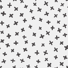 Vector seamless pattern. Abstract background with brush strokes cross. Monochrome hand drawn print with hipster X. Trendy monochrome texture with pluses or crosses, simbols of kisses. hand drawing