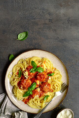 Pasta spaghetti with meat ball in tomato sauce. Top view with copy space.