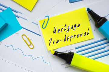 Business concept meaning Mortgage Pre-Approval with inscription on the sheet.
