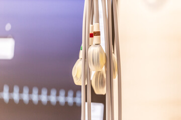 Close-up of electrodes in front of a screen. ECG monitoring