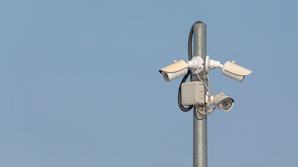 Swivel high quality CCTV camera on sky background.