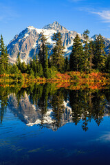 Mount Shuksan in North Cascades National Park reflects in Highwood Lake along SR 542 in Mount Baker Snoqualmie National Forest
