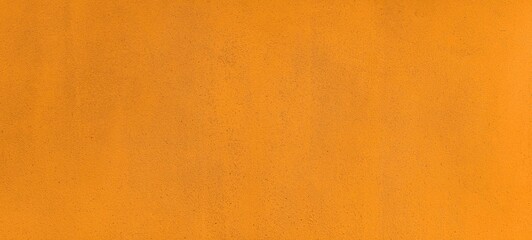 Panorama of Old cement wall outside the building, painted brown, smooth surface texture and background seamless