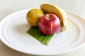 Naklejka na ściany i meble Mixed fruit plate on white brown table