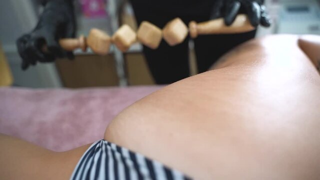 Professional anti cellulite maderotherapy massage treatment