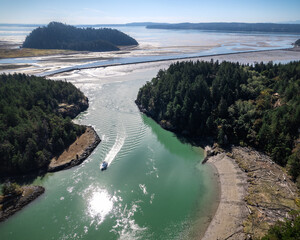 Aerial View of Fishing Boat Traveling Up Swinomish Channel