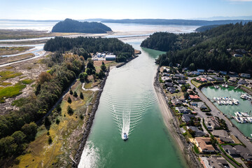 Boat Traveling Up Swinomish Channel in La Connor Washington