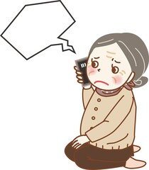 スマートフォンで話す困った表情の高齢の女性。