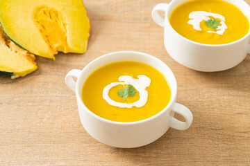 pumpkin soup in white bowl