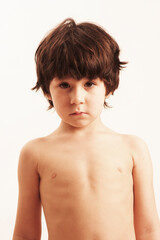 Naklejka premium portrait of sad child looking at camera