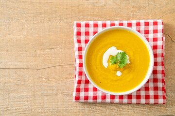 pumpkin soup in white bowl