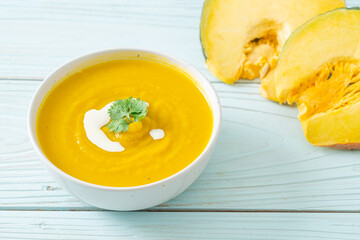 pumpkin soup in white bowl