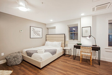 luxury hotel room with neatly made bed
