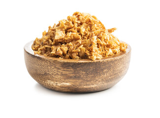 Pieces of fried onions in bowl.