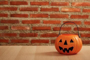 Halloween pumpkin jack o lantern on  wooden planks