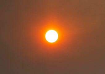 sun covered by smog from fire