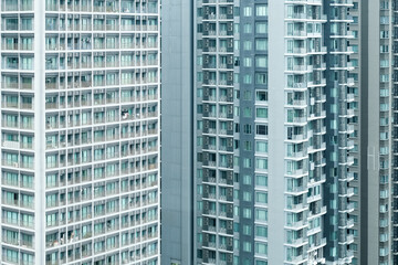 apartment building with colorful facades, Modern minimalistic architecture with lots of square glass windows on the building