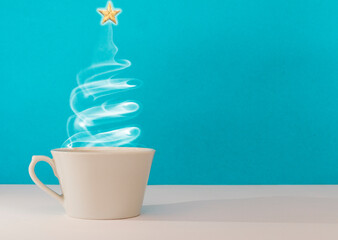Christmas tree made steaming cup of coffee
