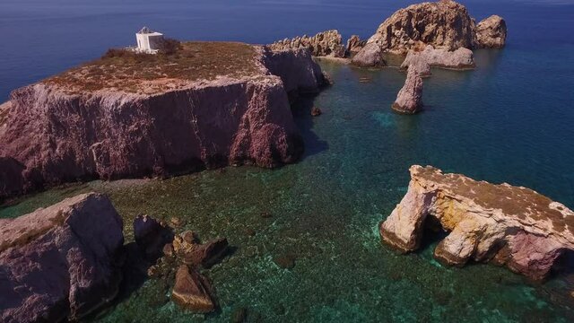 Beautiful island of Saint Spyridon with the church on the top near Paros island in Greece