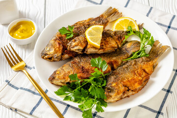 fried crucian carps with golden crispy crust