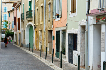 Fototapeta na wymiar Buildings with window shutters, Serignan, Herault, Languedoc Roussillon, France