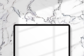 White digital tablet mockup on white marble background vector