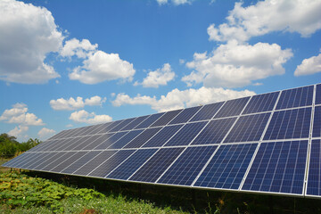 A large ground-mounted solar panel, an alternative energy resource is installed in the backyards of...