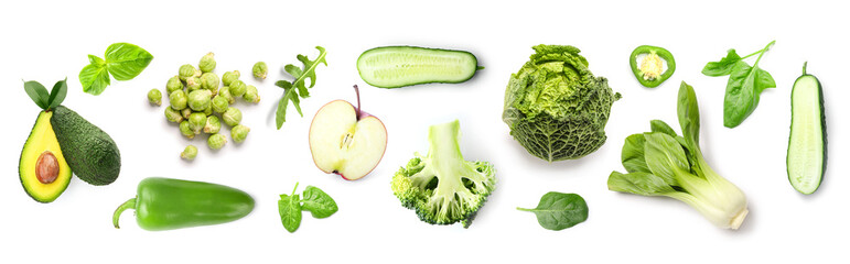 Set of green vegetables and herbs on white background