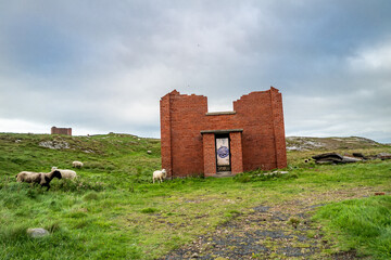 The ruins of Lenan Head fort at the north coast of County Donegal, Ireland.