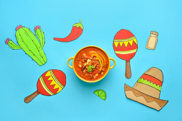 Bowl with tasty chili con carne and drawn symbols of Mexico on color background