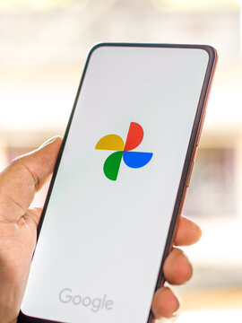 West Bangal, India - September 28, 2021 : Google Photos logo on phone screen stock image.