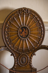 an antique old chair back