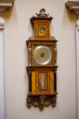 an old antique wall clock