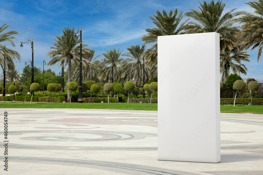 Poster big white blank advertising cube as template for your design in empty city street with palm trees. 3