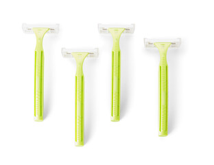 Many razors for hair removal on white background
