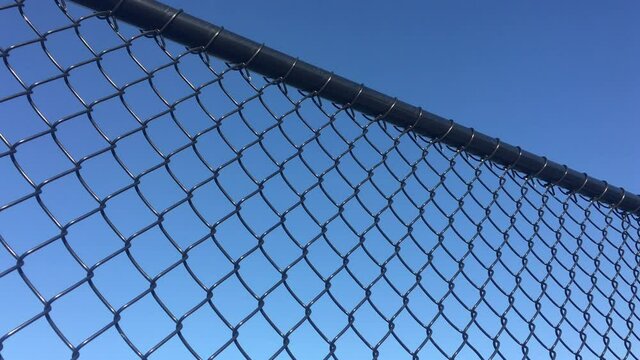 Cyclone chain wire mesh fencing background