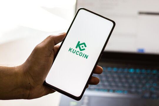 West Bangal, India - September 28, 2021 : Kucoin logo on phone screen stock image.